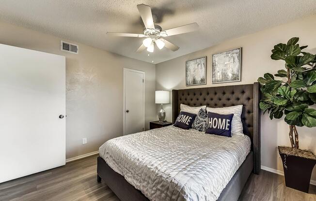 a bedroom with a large bed in a room