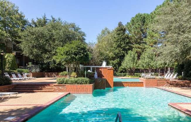 Multi-level swimming pool with large sun deck at Regency Gates in Mobile, AL