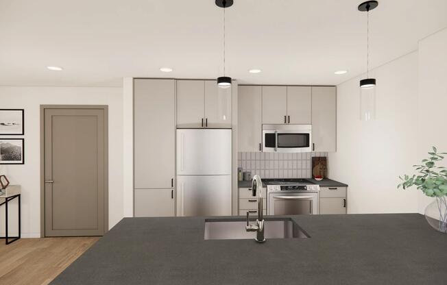 Thoughtfully designed kitchen featuring quartz countertops and stylish pendant lighting.
