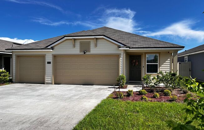 Picturesque Waterfront 4-Bedroom Home with Premium Amenities + 3 Car Garage! Community Amenities!