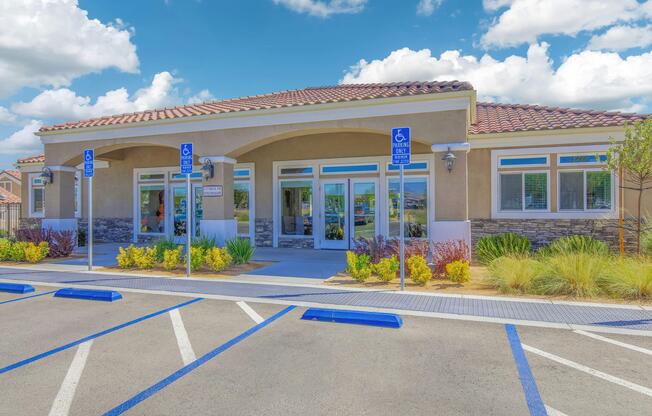 an empty parking lot in front of a building