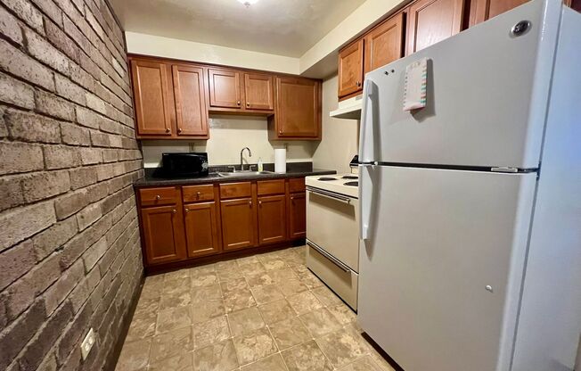 Cozy One Bedroom Apartment! Laundry On-Site, Built-In A/C & More! Call Today!