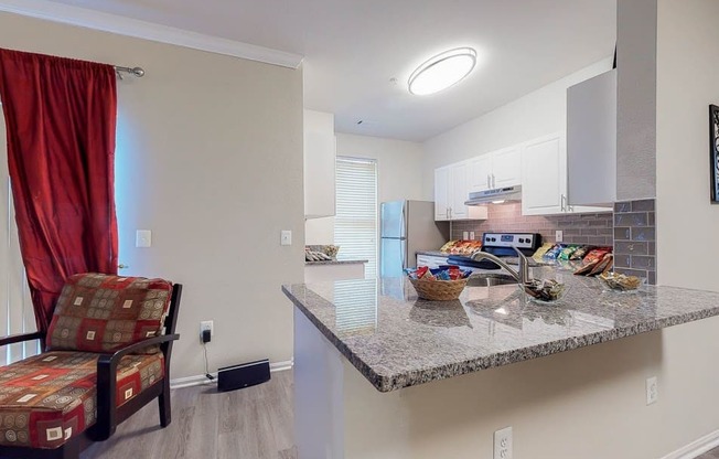 a kitchen with a counter top and a sink