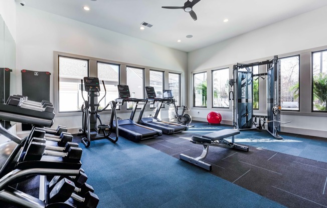 Fitness studio with spin bikes.