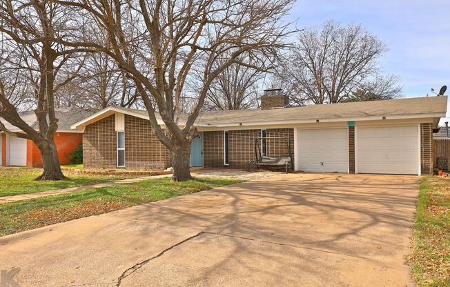 THREE BEDROOM WITH A TWO CAR GARAGE