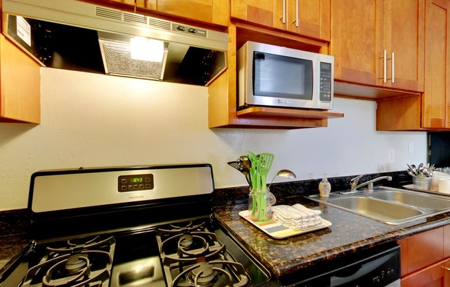 Kitchen area with stainless steel appliances at THE POST Apartments, PLEASANT HILL , CA 94523