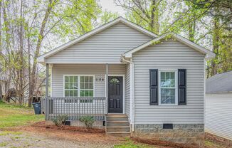 Like New Home off Freeman Mill.  Just Painted, New Wood/Vinyl Flooring, Vaulted Ceilings, Front Porch and Deck!