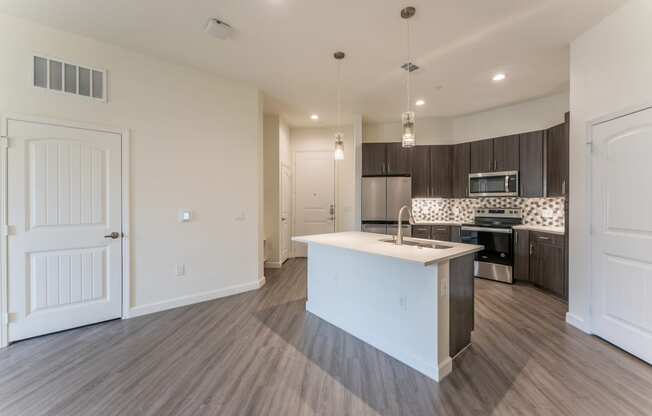 Spacious Full Size Kitchen with pendant lights at Residences at 3000 Bardin Road, Grand Prairie, TX, Texas, 75052