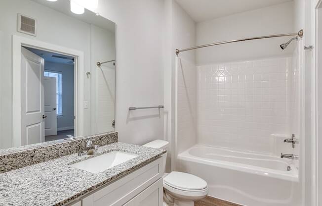 a bathroom with a sink and a shower and a toilet at The Bella at Westchester, Midlothian