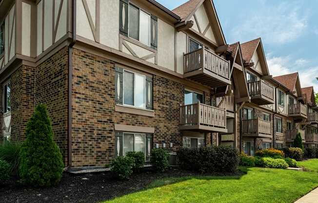 A row of apartment buildings with balconies and windows