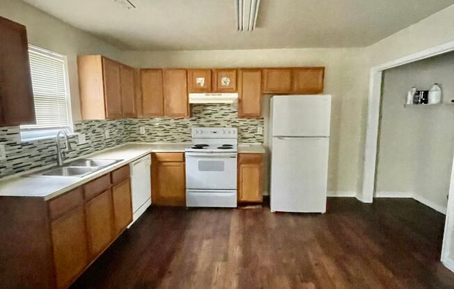 Must see 4 bedroom 2.5 bath townhouse with 1 car garage .