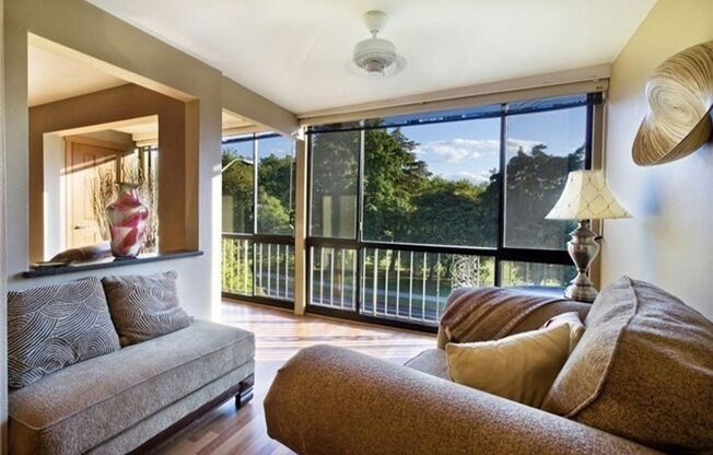 Green Lake Park Haven: Stunning 2-Bed Condo with Park Views, Parking, and More!