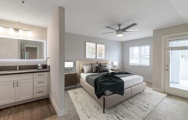 a bedroom with a bed and a ceiling fan