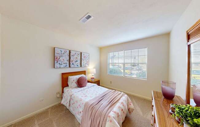 a bedroom with a large walk-in closet