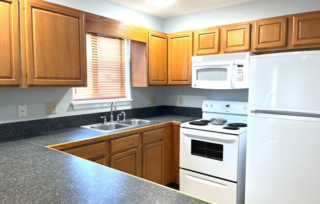 First Floor, 2 Bed, 2 Bath Condo in Surfside with New Paint & Flooring!