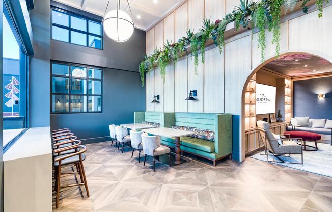 Light-filled gathering spaces at Modera University Park, designed for connection and comfort just minutes from University Park’s local dining and culture.