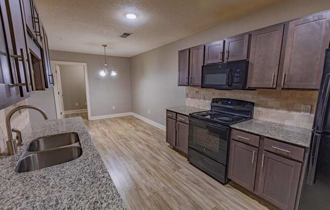 Kitchen Area at Parkside Grand Apartments in Pensacola, FL