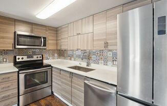 "PRICE DROP!!!!"  Stunningly Updated 1bed 1bath Townhome with Premium Finishes