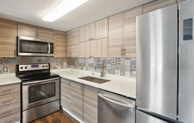 "PRICE DROP!!!!"  Stunningly Updated 1bed 1bath Townhome with Premium Finishes