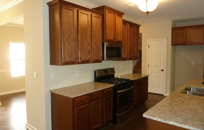 Inviting 4BR Ranch with Bonus Room in a Swim & Play Community