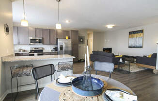 View of kitchen and living room from dining area at WH Flats new luxury apartments in south Lincoln NE 68516