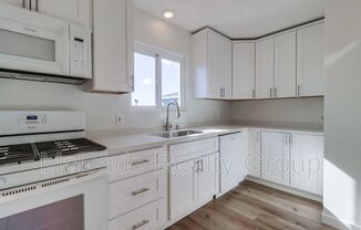 124 E 3 ST