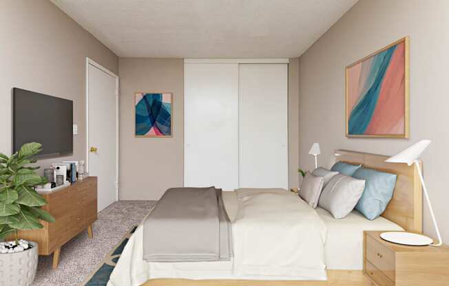 a bedroom with a bed and a tv