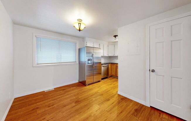Spacious updated 3 bed/3 bath home w/AC and fenced in back yard