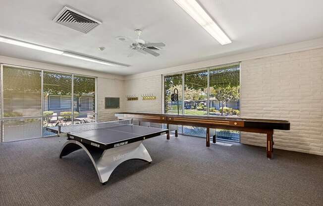 Game room with a ping pong table and a pool at Walnut Creek Manor Apartments in Walnut Creek, CA