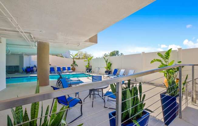 Pool side sitting area1at Midvale Apartments, California, 90024