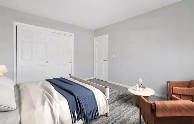 Model Bedroom with Carpet and Closet at Stone Ends Apartments in Stoughton, MA.
