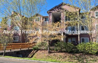 2Bed/2Bath Tanasbourne Condo Quiet Location MiniSplit AC Assigned Parking Space Water & Garbage Included