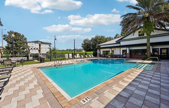 a swimming pool with a building in the background