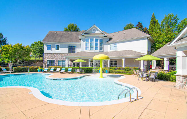 The Asher at Sugarloaf apartments in Lawrenceville Georgia photo of resort style pool.