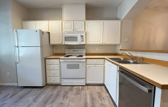 Inviting 2-Bed, 2-Bath Townhome with Updated Kitchen & Gas Fireplace
