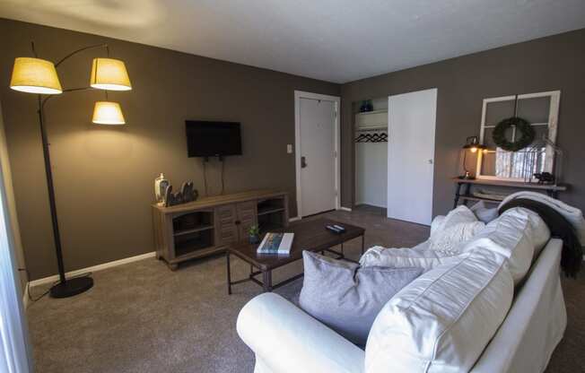 This is a photo of the living room in the 950 square foor, 2 bedroom apartment at Deer Hill Apartments in Cincinnati, OH.