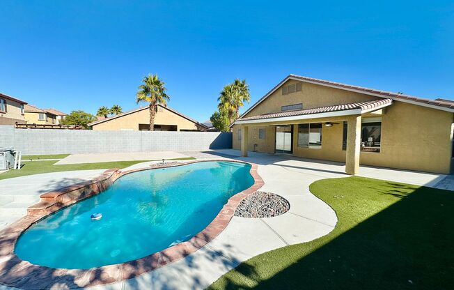 Gorgeous recently renovated single story 4 bedroom home on a large lot with a pool in the Southern Highlands community!