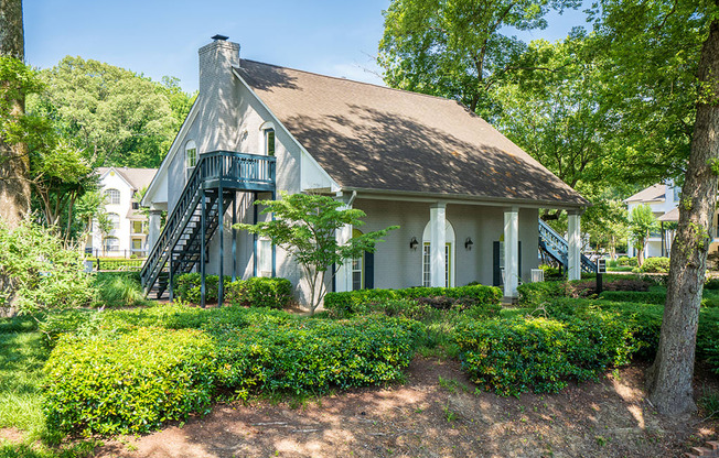 Leasing Center Surrounded by Lush Greenery and Landscaping