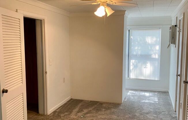 Cozy 1/1 duplex unit on a large lot - Available in June.