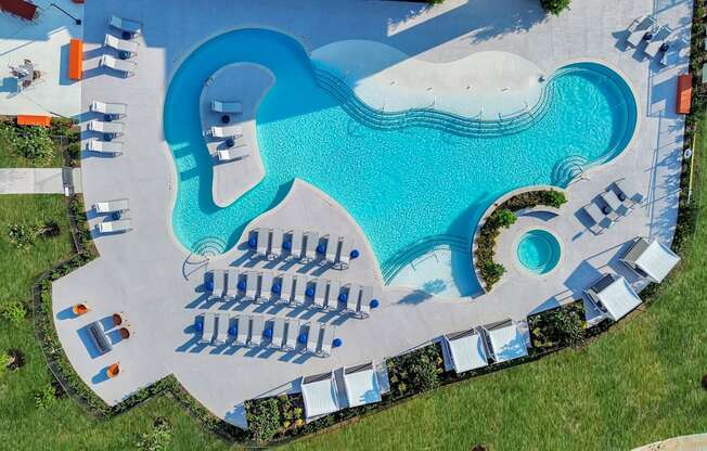 a rendering of a swimming pool at a resort with umbrellas