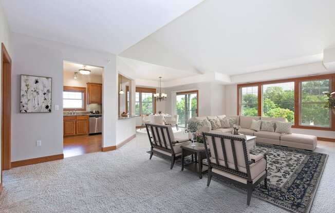 Laurel East End Apartments in Golden Valley, MN photo of a living room with a couch and a table and chairs