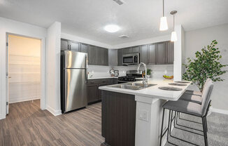 Kitchen with Walk In Pantry at Meadowbrooke Apartment Homes in Kentwood, MI 49512