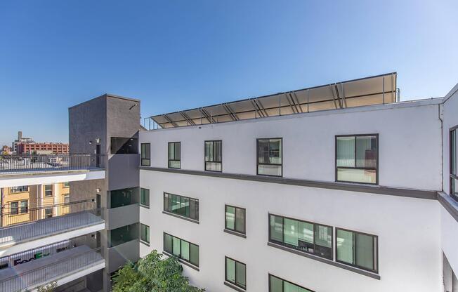 1825 Mission community building with blue skies