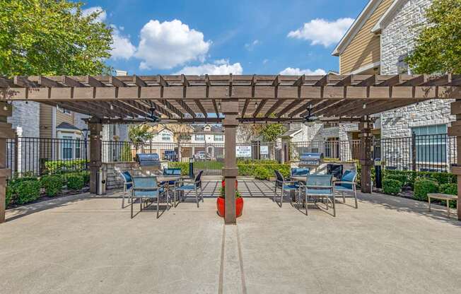 A sunny day at the outdoor seating area of a restaurant or cafe.