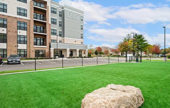 the preserve at green valley apartments exterior view of building and grass