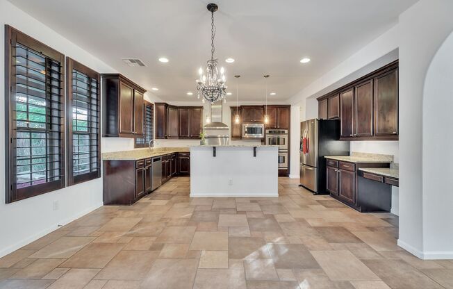 Highly Upgraded SPACIOUS home in desirable Aviano in Desert Ridge!