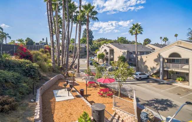 An aerial view of a BBQ & Picnic Area and property at Meadow Creek Apartments in San Marcos, CA