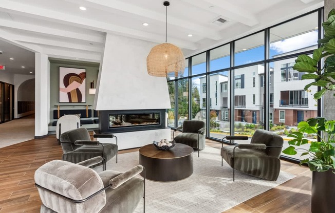 A modern living room with a fireplace and comfortable seating.