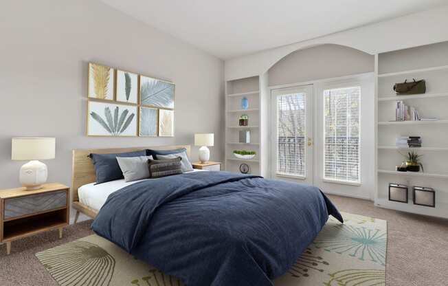 a bedroom with a bed and a large window at Orleans, Columbus, 43221
