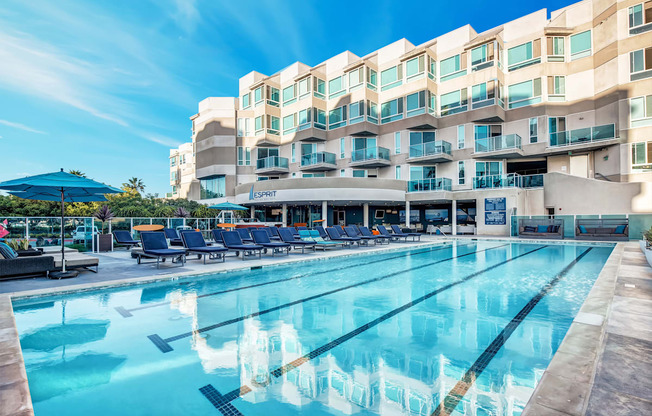 A large swimming pool in front of a multi-story hotel at Esprit Marina del Rey, 90292